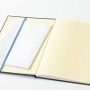 A1サイズのM9notesZを折って、B5版の手帳に挟んで携帯しているところ